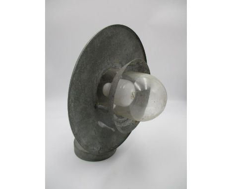 A vintage galvanised industrial lamp
