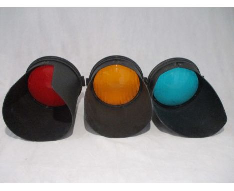 A set of traffic light lens with hoods