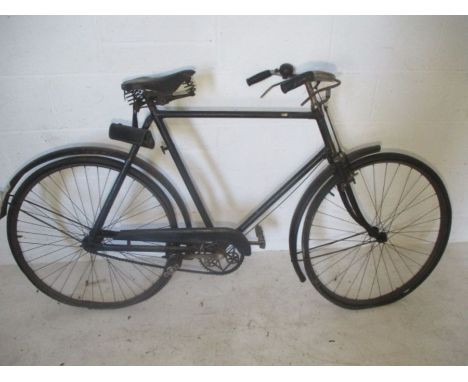 A vintage Dunlop bicycle circa 1940's. Plus a vintage Dunlop puncture repair kit.