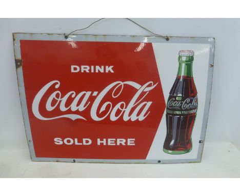 A Coca Cola part pictorial rectangular enamel sign in very good condition with excellent gloss, 28 x 20".