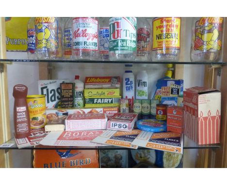 A shelf full of various packaging, products including Borax, Sunlight Soap, Chipso, and Lifebuoy Soap.