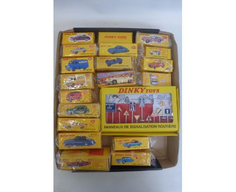 A tray of brand new reproduction Dinky Toys.