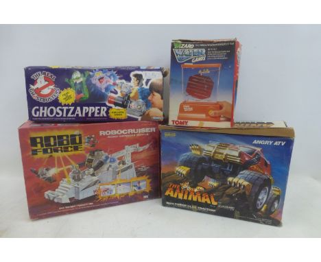 A boxed galoob "The Admiral" 4 x 4 with claws, a boxed Tomy Wizard Water Game, a Ghostbuster's "Ghostzapper" and a Robocruise