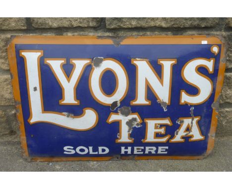 A Lyons' Tea Sold Here convex enamel sign, 29 1/4 x 19 1/2".