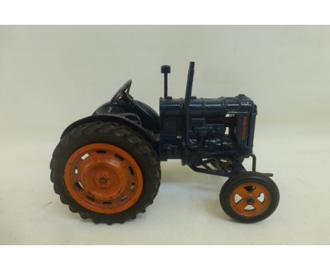 A Chad Valley Fordson Major tractor in dark blue.