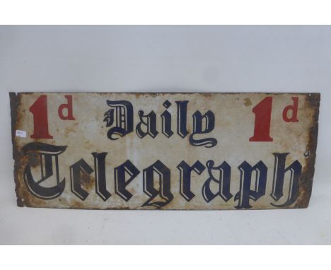 A rectangular Daily Telegraph rectangular enamel sign, 19 1/2 x 7 1/2".