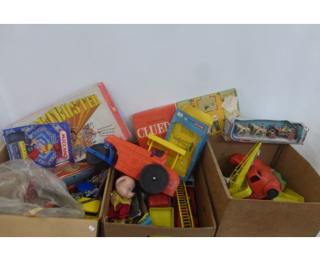 Three boxes of assorted plastic and other toys including a large scale steam roller, also a tinplate spinning top etc.