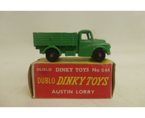 DINKY DUBLO - Austin Lorry, no. 064, in very near mint condition, black plastic wheels, yellow/red box good, but old sellotap