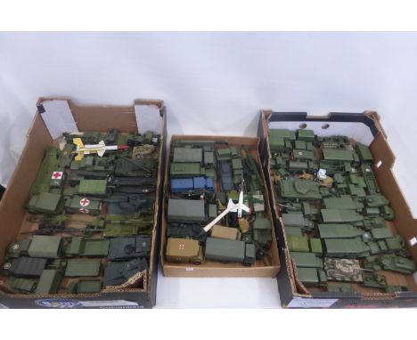 Three trays of military die-cast models, including Dinky, Corgi and Matchbox, mostly if not all repainted.