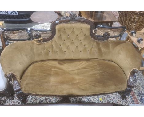 Early Victorian sofa&nbsp;with mahogany carved show frame, turned and carved front legs to white china castors