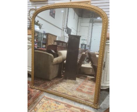 C Nosotti, late Victorian large arch-topped overmantel mirror in moulded frame, with plaque to back 'C Nosotti carver and gil