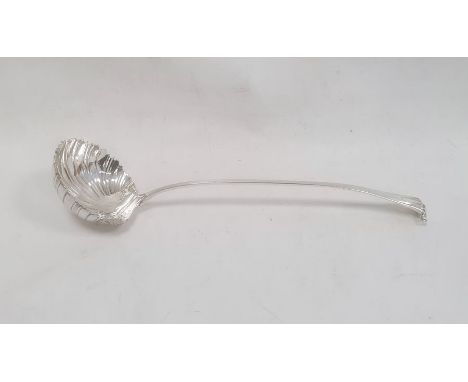 George III silver ladle, shell-shaped with scroll handle, indistinctly initialled to handle, London 1763(?), makers mark worn