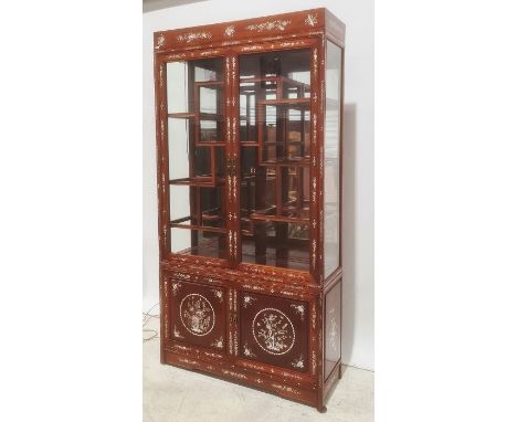 Pair of Chinese style cabinets with mother-of-pearl decoration on eastern hardwood frame, glazed doors, cupboard doors under,