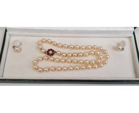 Cultured pearl necklace, single strand, 44cm and the 9ct gold garnet and seed pearl cluster set clasp and a pair simulated pe