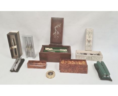Cased set of dominoes, a thuyawood cased set of dominoes, a cased set of dice, a cased penknife, a cased set of dominoes in w
