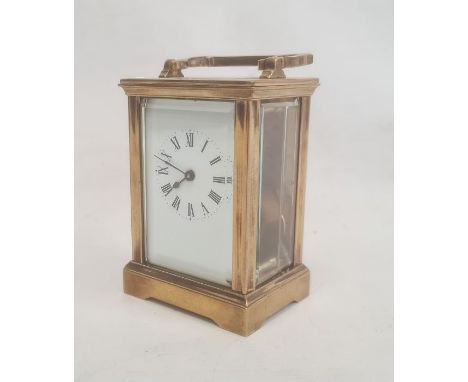 Brass and glass five-sided carriage clock with Roman numerals, bracket feet&nbsp;