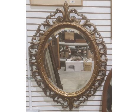 Oval mirror in modern moulded acanthus leaf frame