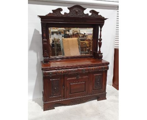 Victorian walnut mirror back dresser, with moulded decoration, three assorted drawers above the three cupboard doors, all on 