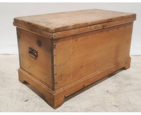 Vintage pine trunk, rectangular top, the whole raised on bracket feet, 92.5cm x 52cm