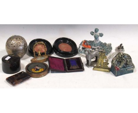 Various decorative items: swinging gilt putto with oval base, circular printed portrait box, small bakelite case, bowl, 'gold