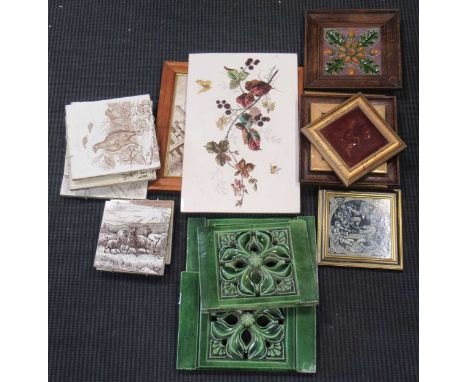A collection of 20th century tiles, to include a Maw &amp; Co acorn relief tile, Minton "Old King Cole", Minton tile depictin