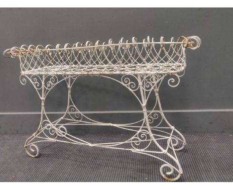 A wirework planter 55 x 88 x 43cm
