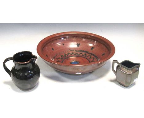 A Winchcombe Pottery dish, together with a jug and a Ray Finch (Winchcombe) metallic glaze jug (3)condition generally good. S