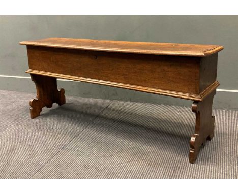 A 17th century Continental walnut sword chest on bench end legs, 54 x 124 x 30cmSome signs of repair, a patch on the body and