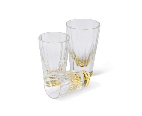 A group of Art Deco liqueur glasses, probably Bohemian,  of facetted form in three different sizes and each with enamelled be