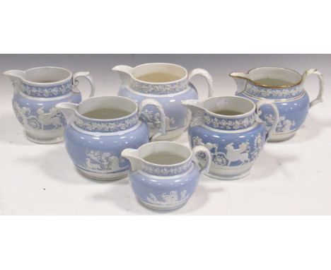 Six 19th century ceramic jugs in similar style, one with contemporary gift inscription