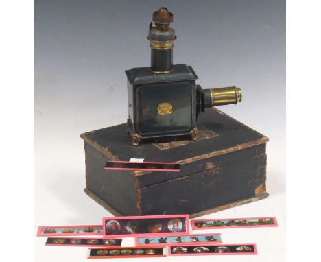 A German spirits magic lantern with slides in original box