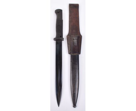 WW2 German K98 Bayonet, with two piece bakelite grips, blued steel fittings and housed in steel scabbard. Attached to scabbar