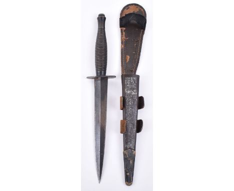 British Fairbairn Sykes (F.S) Commando Knife, with blackened brass one piece ribbed handle and nut fitting to top. Oval cross
