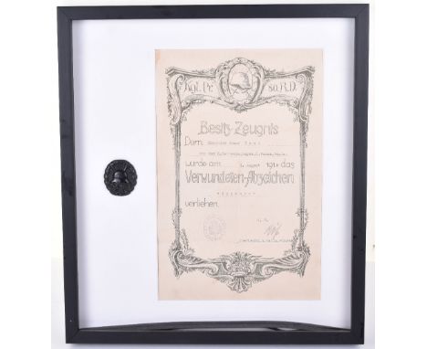 WW1 German Wound Badge and Citation Grouping, good example of a black grade wound badge with Imperial German steel helmet to 