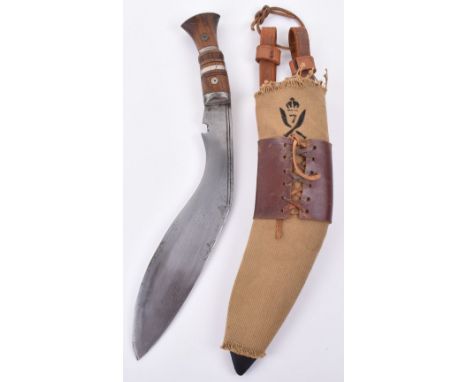 British Military Gurkha Kukri, with wooden grip and steel top plate mount. Curved polish steel single edged blade. Housed in 