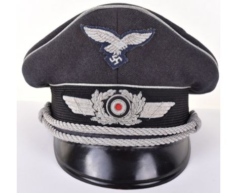 WW2 German Luftwaffe Officers Peaked Cap, fine example being a high fronted blue grey cloth example with silver bullion wire 