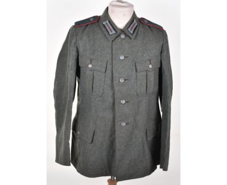 WW2 German Army M-42 Combat Tunic, green wool four pocket combat tunic which has replaced Artillery shoulder boards and colla