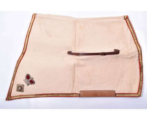 British Victorian Shabraque of a Lieutenant Colonel, fine example in beige cloth bordered with gilt braid trim set upon red c