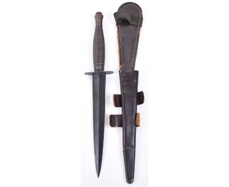 British Fairbairn Sykes (F.S) Commando Knife, with blackened brass one piece ribbed handle and nut fitting to top. Oval cross