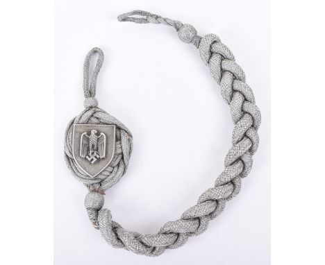 Third Reich Marksman’s Lanyard, knotted bullion lanyard with central metal shield having German army eagle to the centre. Fie