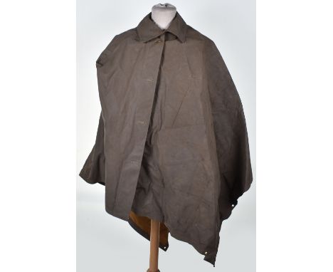 British Army Officers Rain Mack / Poncho, interesting example in dark brown canvas material with buttons and brass eyelets. S