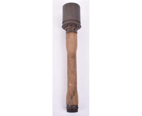 Inert WW2 German Stick Grenade, good untouched example with wooden shaft. Removable lower cap with porcelain ball and string.