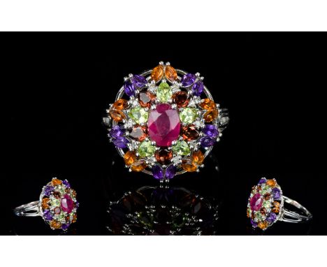 A Ladies Silver, Niassa Ruby, Hebel Peridot, Mozambique Garnet, Amethyst, Citrine And Diamond Ring A statement piece with unu