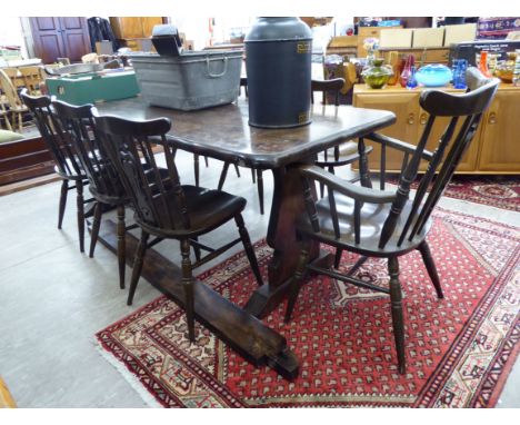 A modern stained oak refectory table with a carved wavy edge, raised on lyre shaped ends  30''h  84''w; and a set of eight be