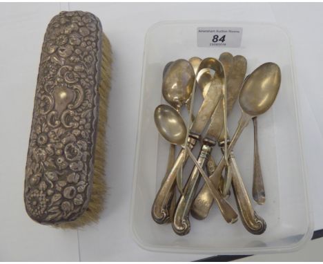 Silver flatware; and a silver backed clothes brush  mixed marks       11