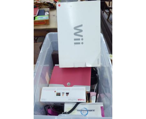 A mixed lot: to include a Nintendo Wii console and various games        S
