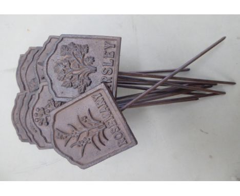 Twelve cast iron garden herb patch markers       OS2