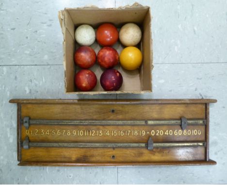 Eight various coloured ivory snooker/billiards balls  approx. 2''dia & one 1.75''dia; and an associated hanging scoreboard   