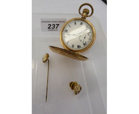 A Dennison gold plated cased full hunter pocket watch, the keyless movement faced by a white enamel Roman dial with subsidiar