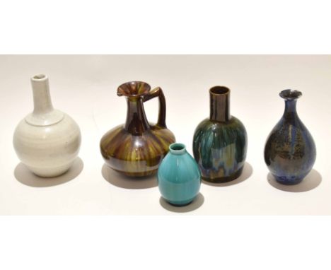 Group of high fired pottery wares comprising a Pilkington green glaze vase^ two further glazed vases with iridescent glaze an